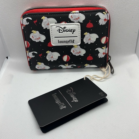 Loungefly Handbags - Loungefly Disney Dumbo Circus Icons Mini Zipper Wallet. NWT